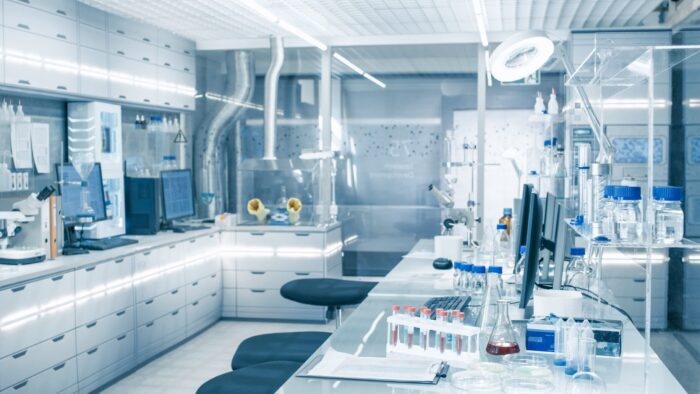 Bright and Ultra Modern High Tech Laboratory Full of Advanced Technological Wonders, Computers, Analyzing Machines, Test Tubes and Beakers.
